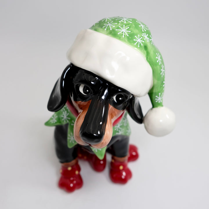 Dachshund in elf hat figurine