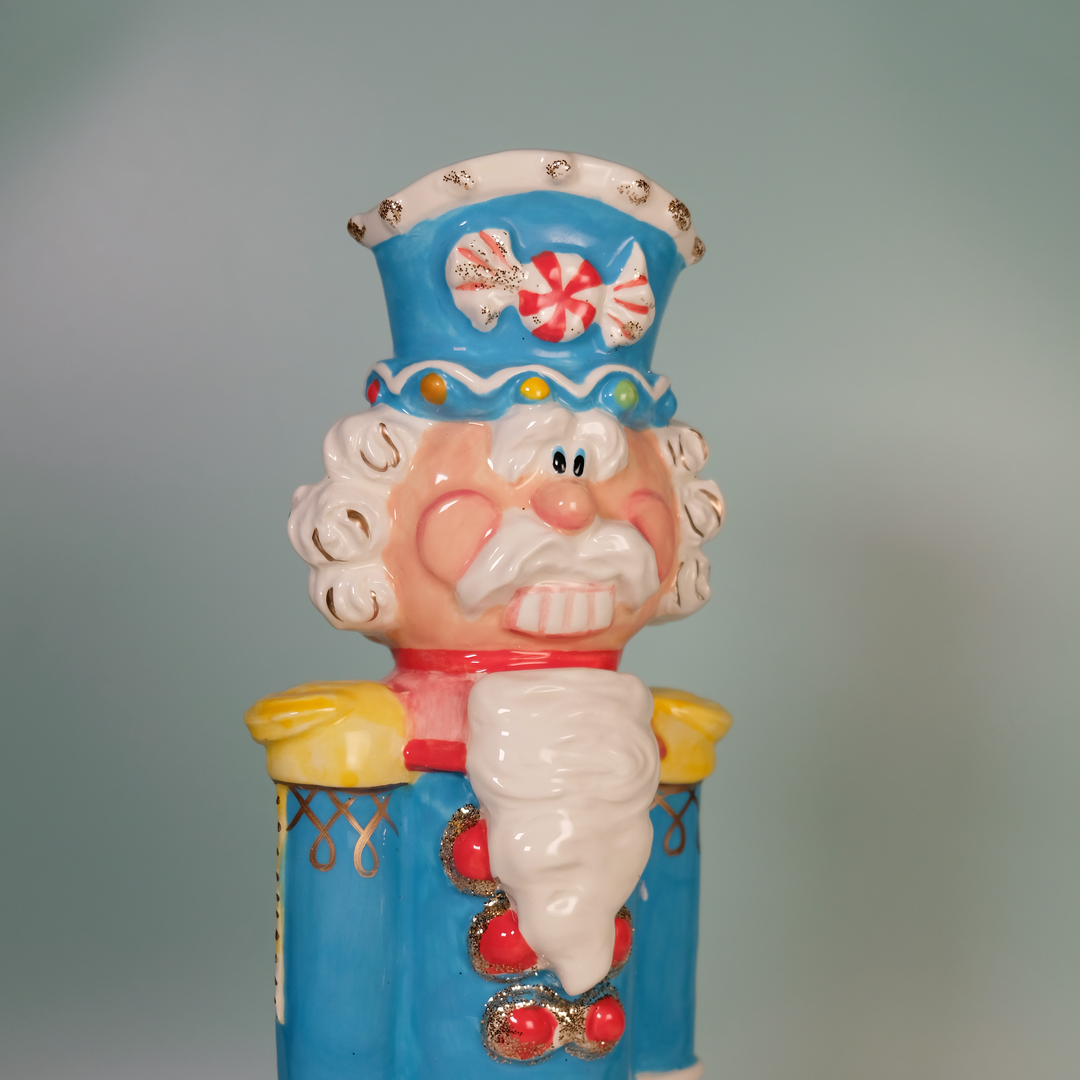 TROPHY COLOR NUTRACKER FIGURINE