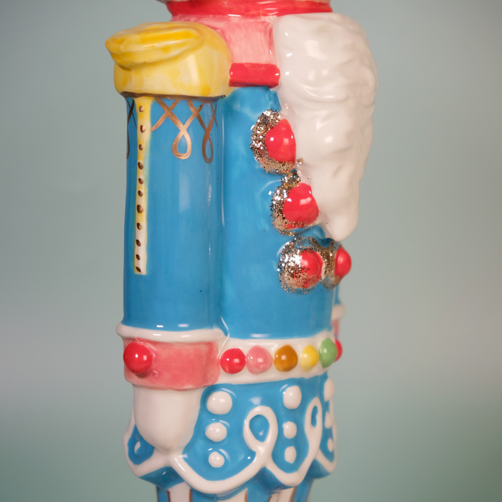 TROPHY COLOR NUTRACKER FIGURINE