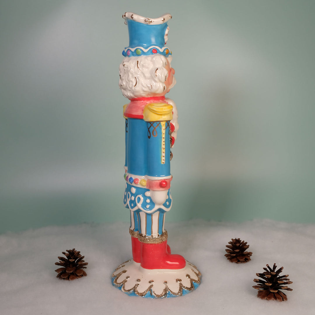 TROPHY COLOR NUTRACKER FIGURINE