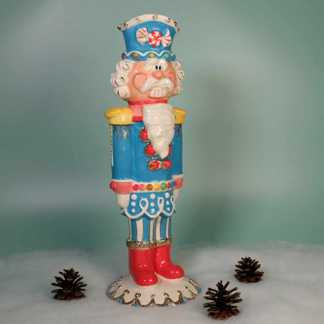 TROPHY COLOR NUTRACKER FIGURINE