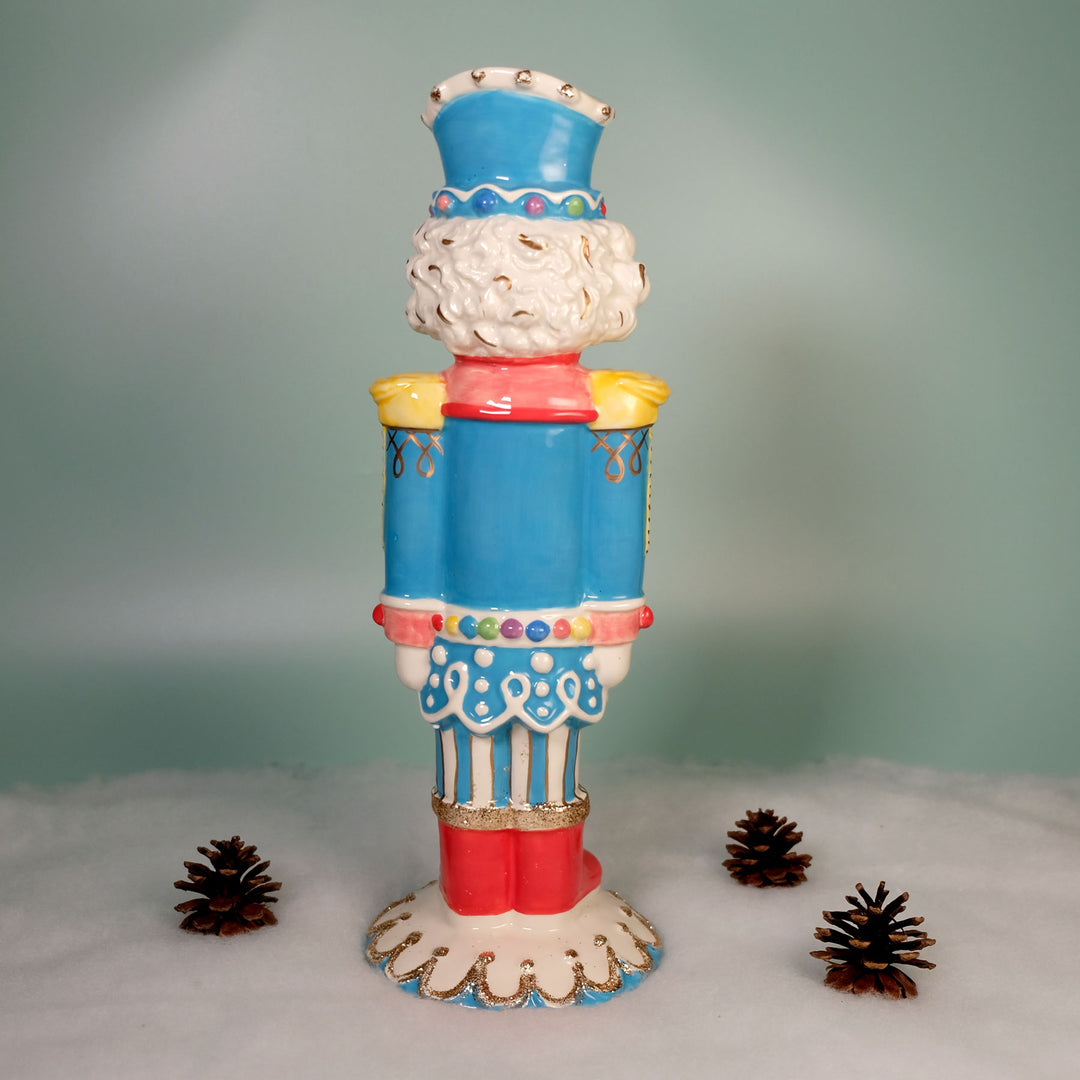 TROPHY COLOR NUTRACKER FIGURINE