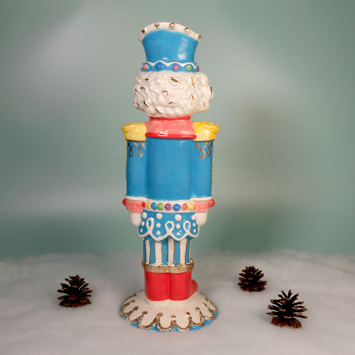 TROPHY COLOR NUTRACKER FIGURINE