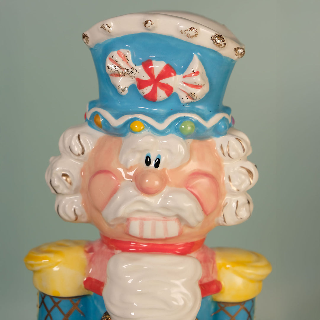 TROPHY COLOR NUTRACKER FIGURINE