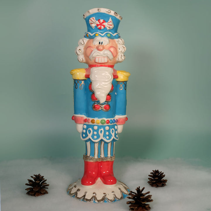 TROPHY COLOR NUTRACKER FIGURINE