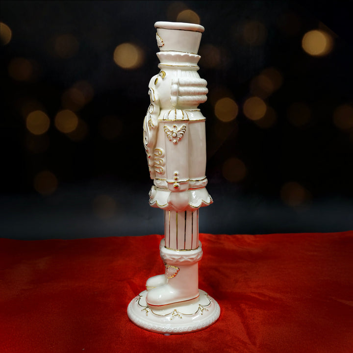 Trophy White Gold Nutcracker Figurine