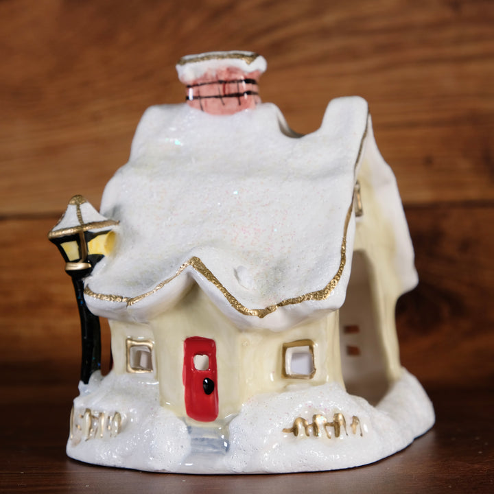 Snowy Candle House