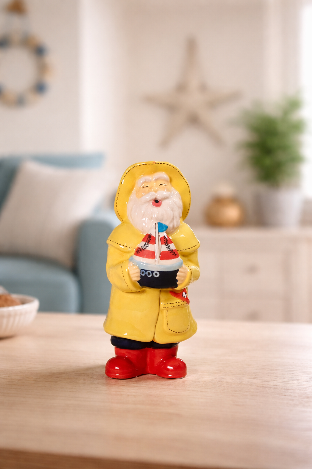 Man Holds the Sailboat Figurine