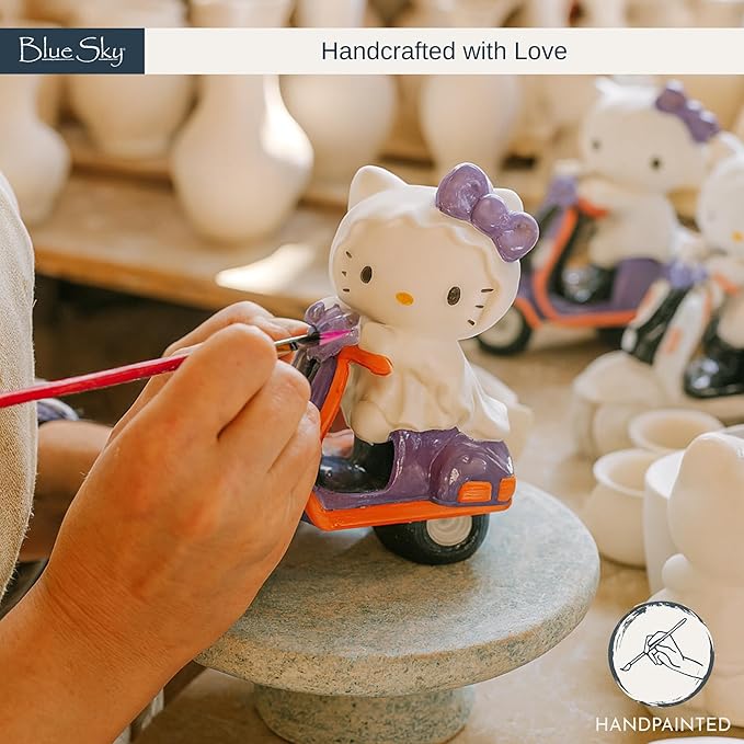 Hello Kitty Bat Scooter Figurine