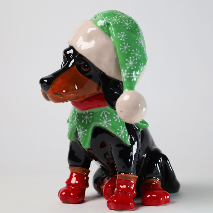 Dachshund in elf hat figurine