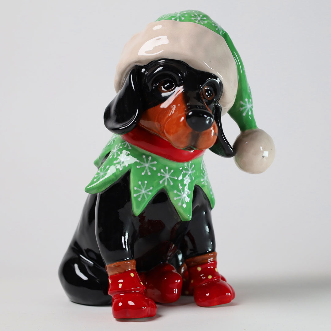 Dachshund in elf hat figurine