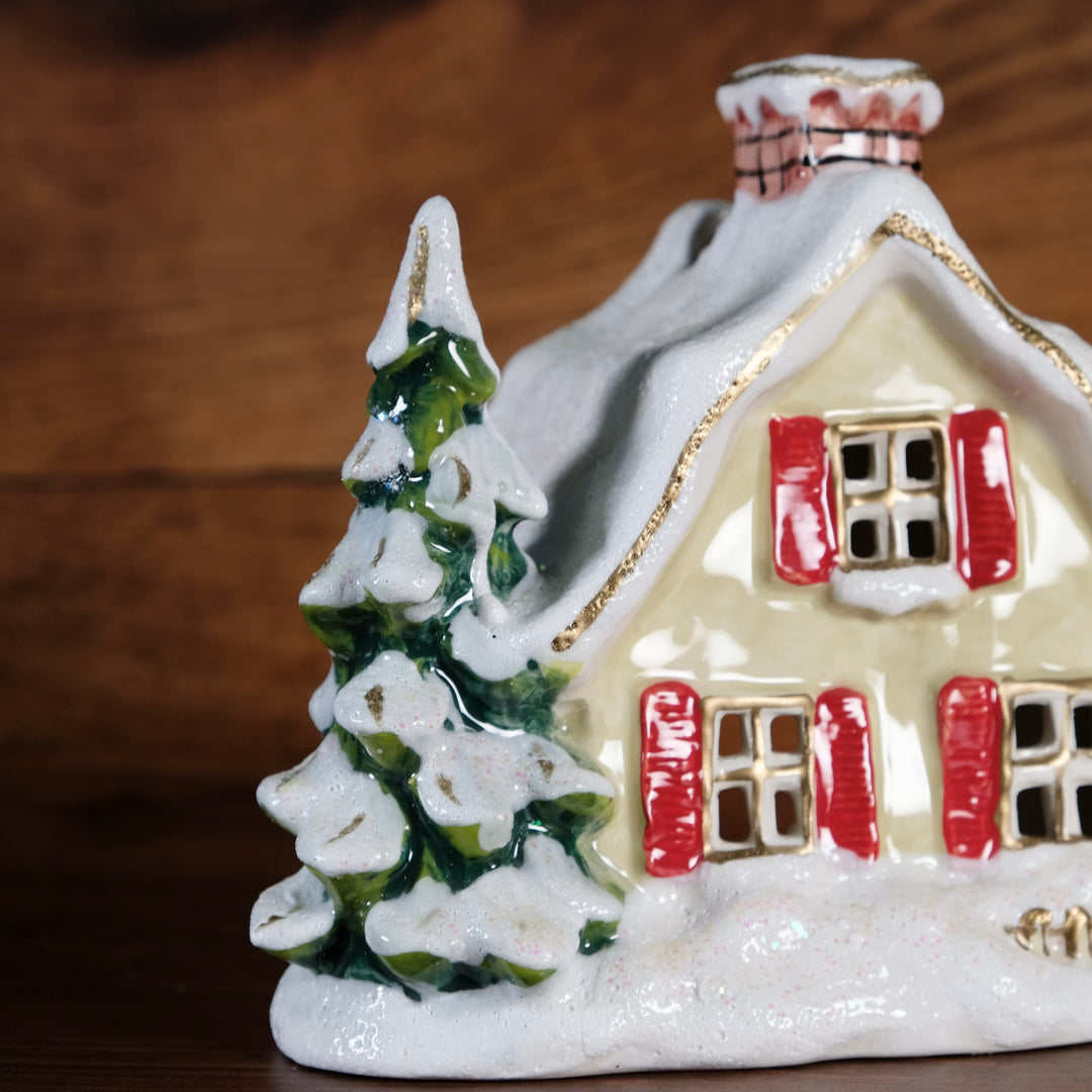 Snowy Candle House
