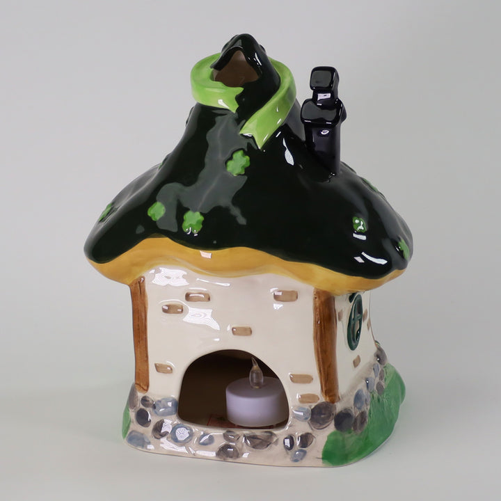 THE DRUNKEN LEPRECHAUN CANDLE HOUSE