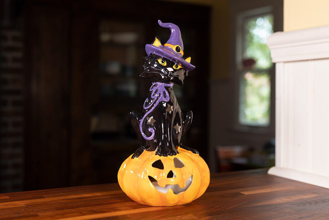 BLACK CAT ON PUMPKIN TEALIGHT HOLDER