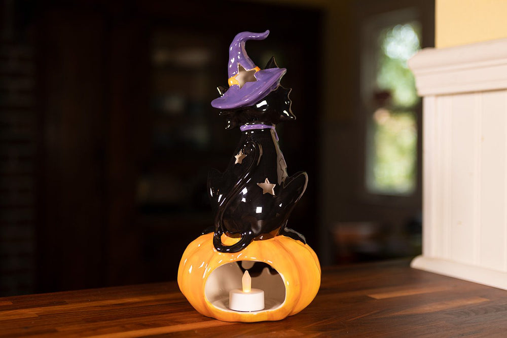 BLACK CAT ON PUMPKIN TEALIGHT HOLDER