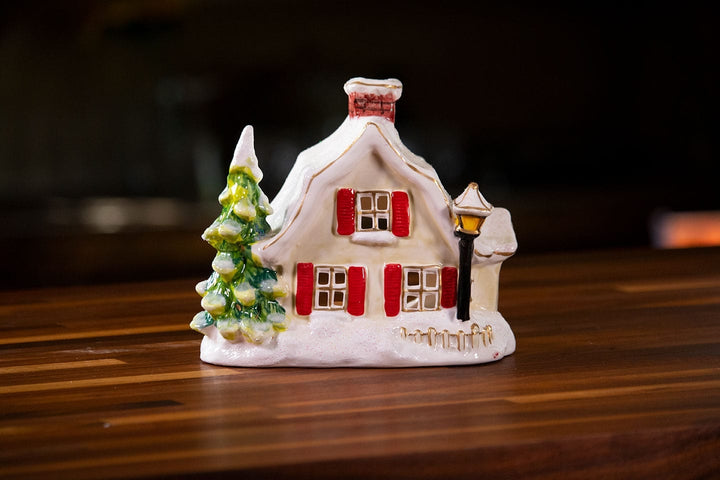 Snowy Candle House